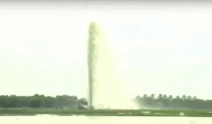 Blown water Leak in the suburb of Peddakodepaka.. Crop fields filled with water.. The reason is that the water flows under high pressure.
