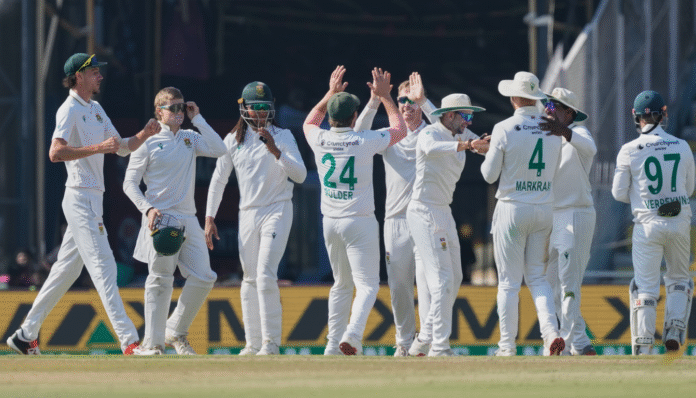 “గువాహటి టెస్ట్‌లో భారత బ్యాటర్లు వరుసగా వికెట్లను కోల్పోతుండగా సఫారీ బౌలర్లు ఆధిపత్యం ప్రదర్శిస్తున్న దృశ్యం.”